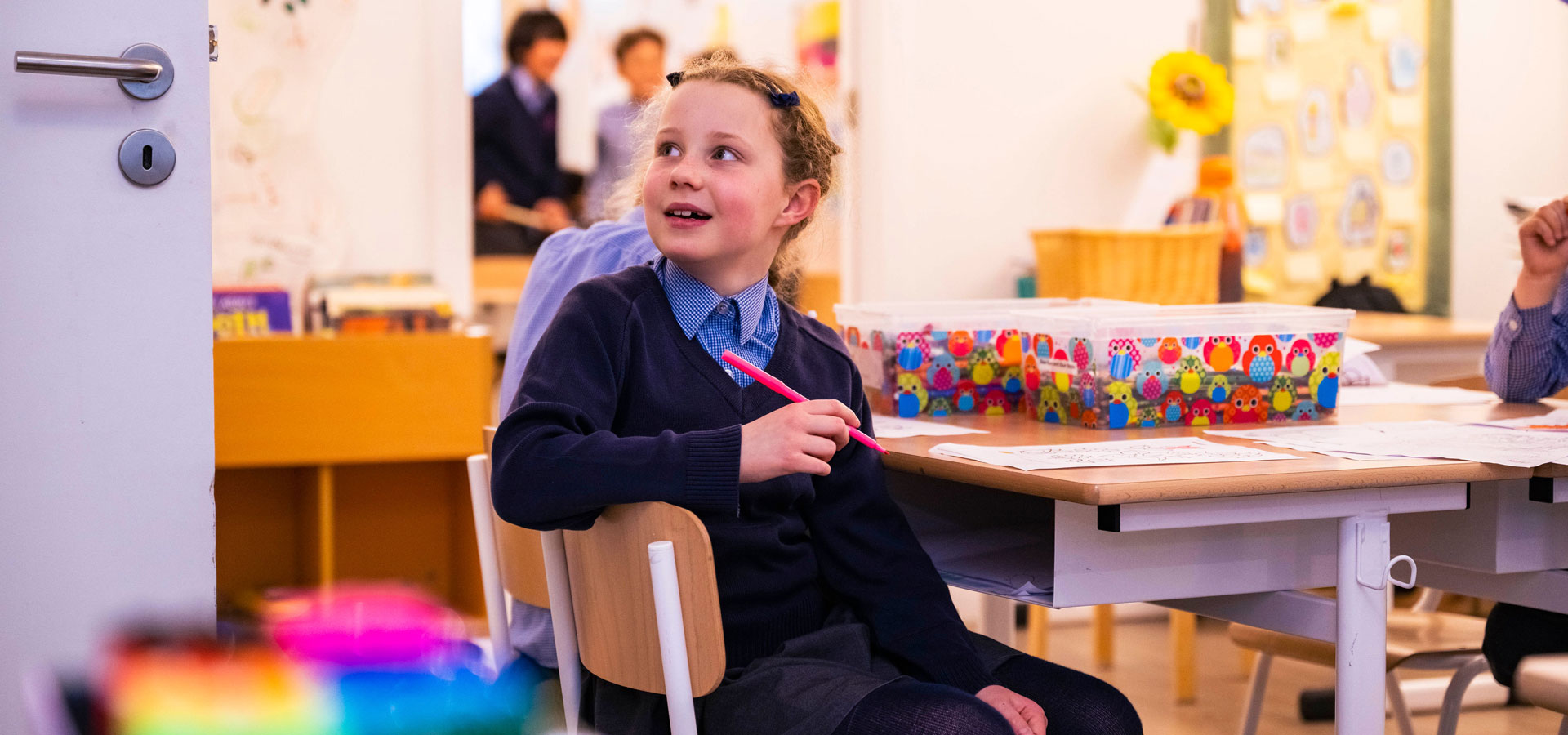 Prep school student in class at BJAB.